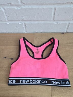 New Balance Coral Pink Racerback Sports Bra with Black Trim